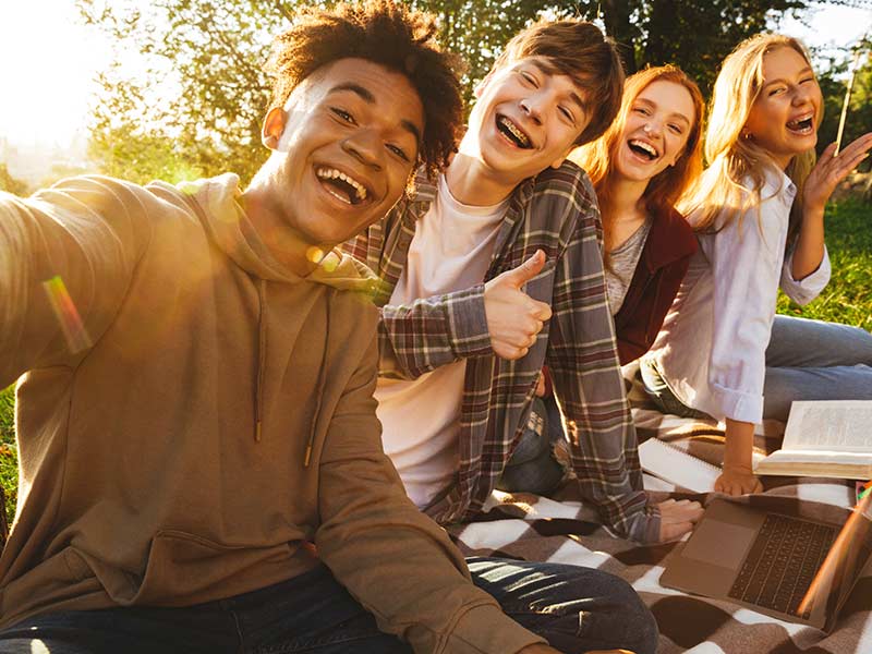 Group of cheerful multhiethnic high school students