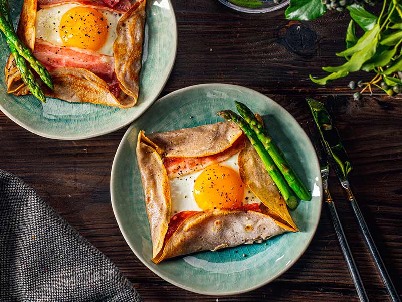 Galette, French food buckwheat pancake, with egg in plate