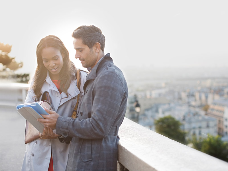 female tourist asking a frenchman for directions