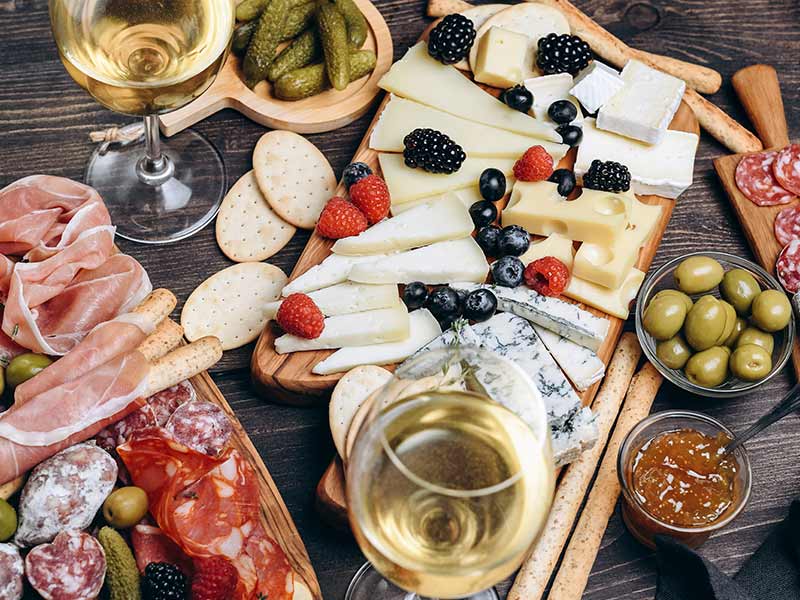 Сheese board with different types of French cheese