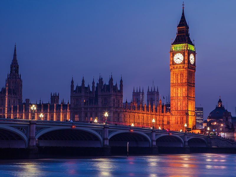 Big Ben in Westminster on River Thames, London at night