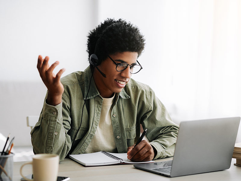 black teenager working online