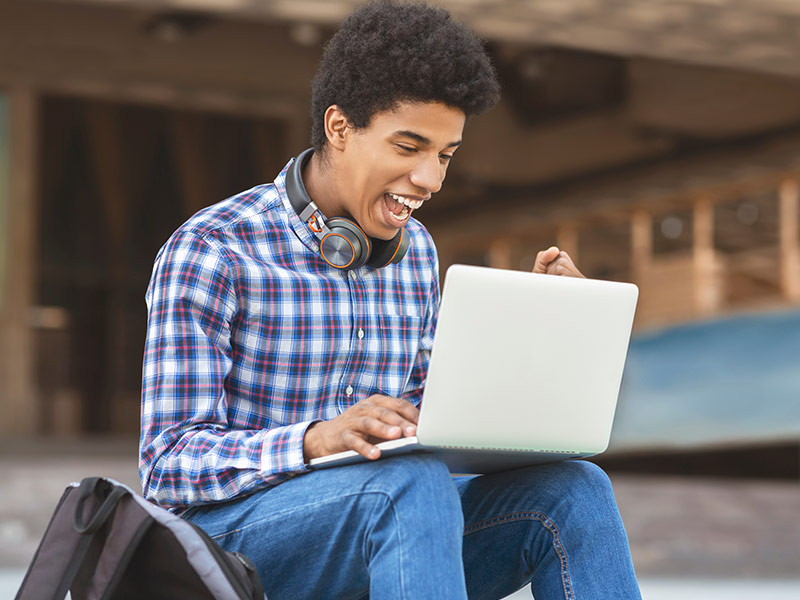 teenage tudor celebrating getting paid by his student's parents