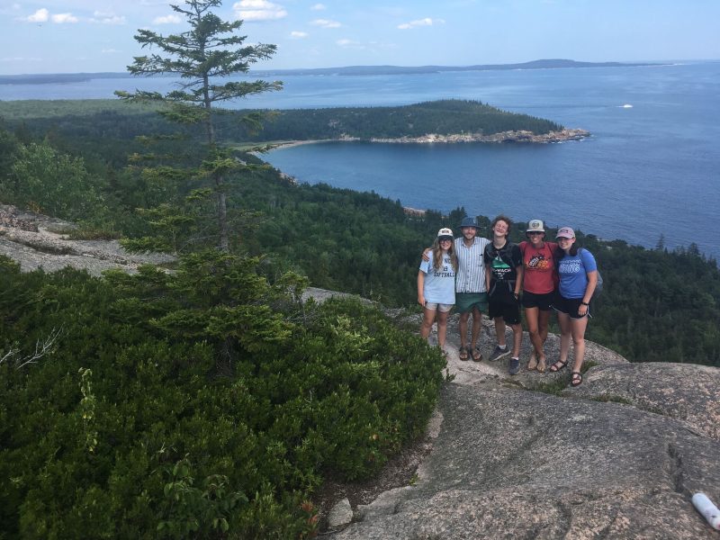 bike tourists on the coast of maine